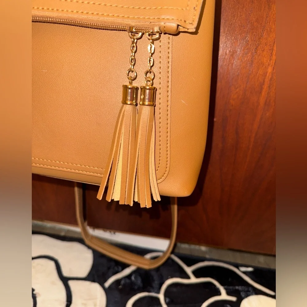 GORGEOUS CAMEL COLOR MINI BACKPACK WITH CONVERTIBLE STRAPS AND ACCENT TASSELS